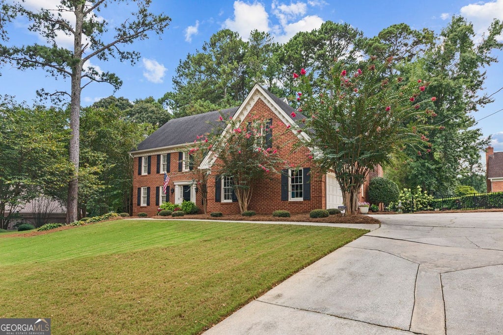 Photo of 877 Guinevere Way SW, Lilburn, GA 30047 (MLS # 10841049)