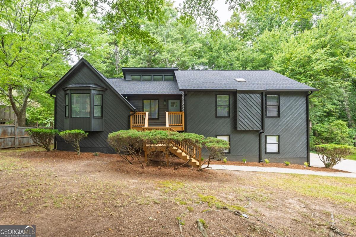 This charming 3-bedroom, 2-bath residence features fresh interior/exterior paint, brand new flooring throughout, and stylish new light fixtures that brighten every space. Enjoy cooking in the updated kitchen with brand new appliances, perfect for both everyday living and entertaining. Stay comfortable year-round with a brand-new HVAC unit. Step outside to a spacious brand-new deck-ideal for grilling, relaxing, or gathering with friends. Conveniently located near shopping, parks, and top-rated schools, this move-in ready gem offers modern upgrades and timeless charm. Don't miss it!