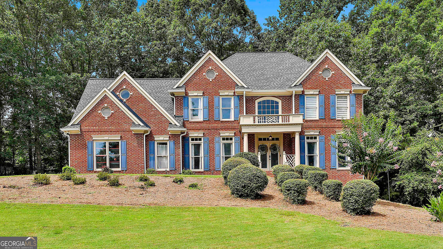 GREAT PRICE & IMPROVEMENTS! WOW! 4 Bedrooms/3.5 Baths & nearly 4000 SF plus over 1000 SF of UNFINISHED TERRACE LEVEL (more equity)! NEW SOD AND DECK 6/25! Plenty of space to play football! Welcome to this stunning luxury residence that exudes elegance & charm from the moment you arrive. Featuring a beautifully manicured front yard with lush greenery & intricate landscaping, the exterior charm draws you into the Covered Front Porch. Upon entering, you are instantly captivated by the spacious two-story foyer, highlighted by soaring ceilings & abundant natural light that floods through large windows complemented by an incredible chandelier. The entry leads to an open-concept living area that seamlessly blends comfort & style. Exquisite moldings & a sophisticated color palette enhance the aesthetic appeal throughout the home. Flanking each side of the grand foyer is a Formal Living Room & a separate Formal Dining Room, each with spectacular lighting & features. The gourmet kitchen is a chef's dream, boasting ample cabinetry & countertops, where modern appliances combine functionality & style. The kitchen layout is well-designed, allowing for effortless meal preparation & entertaining, complete with a cozy breakfast nook with MINI JUICE FRIDGE & bathed in light from multiple windows, offering serene views of the private backyard. UPGRADES GALORE includes HIGH END APPLIANCES, Elaborate trim & molding, EXOTIC GRANITE COUNTERS with WATERFALL EDGE, SEPARATE WINE & JUICE COOLERS, a kitchen sink with more features than most full kitchens, & so much more! It is a true highlight & the absolute Heart of the Home for family gatherings & entertaining. Nearby is a Bar Area with ample shelving & wine cooler. Adjacent to the kitchen is a spacious living room featuring a stunning fireplace as a focal point, perfect for cozy gatherings on chilly evenings. Large windows frame lovely views of the outdoors & allow natural light to pour in, creating a seamless connection with nature. The Primary Suite is truly a sanctuary, featuring large windows & an expansive layout that provides ample space for a king-sized bed & additional furniture. The en-suite bathroom showcases a luxurious spa-like atmosphere, complete w/soaking tub surrounded by elegant fixtures & mirrors. Dual vanities offer convenience, while a spacious walk-in shower adds a modern touch. The Primary Bedroom includes TWO CLOSETS. The larger closet has a SECRET DOOR to an adjacent FLEX ROOM (possible 5th BR or OFFICE), providing great flexibility & a little fun. Additional bedrooms are generously sized & can easily accommodate various needs, whether for family members, guests, or a dedicated home office. Each room boasts large windows that invite in warm sunlight. In addition, there is a spacious entertainment LOFT AREA w/back stairwell leading to the kitchen. This residence also boasts a partially finished TERRACE LEVEL which includes one last finished bedroom & foyer area. There is an additional 1000+ SF of open terrace level space providing additional living space that can be customized for a game room, fitness area, or more storage. With ample room for creativity, this space is a blank canvas ready to be transformed & ideal for future projects & increase the equity of this already spectacular home. The backyard is a private retreat, featuring a large deck (new deck on the way) that promises countless afternoons of outdoor entertainment. 3 CAR SIDE ENTRY GARAGE W/ELECTRIC CAR CHARGER adds more storage & convenience. The well-maintained lawn provides ample space for recreational activities & gardening, while the surrounding trees offer privacy & a natural setting. Beyond that is a HUGE UTILITY EASEMENT ideal for playing ball or 4-wheeling. COMMUNITY POOL, TENNIS/PICKLEBALL & PLAYGROUND! Situated in a tranquil setting, this home offers the perfect blend of luxurious living & comfortable family life. From meticulously designed interiors to exceptional outdoor spaces, this is a MUST SEE HOME