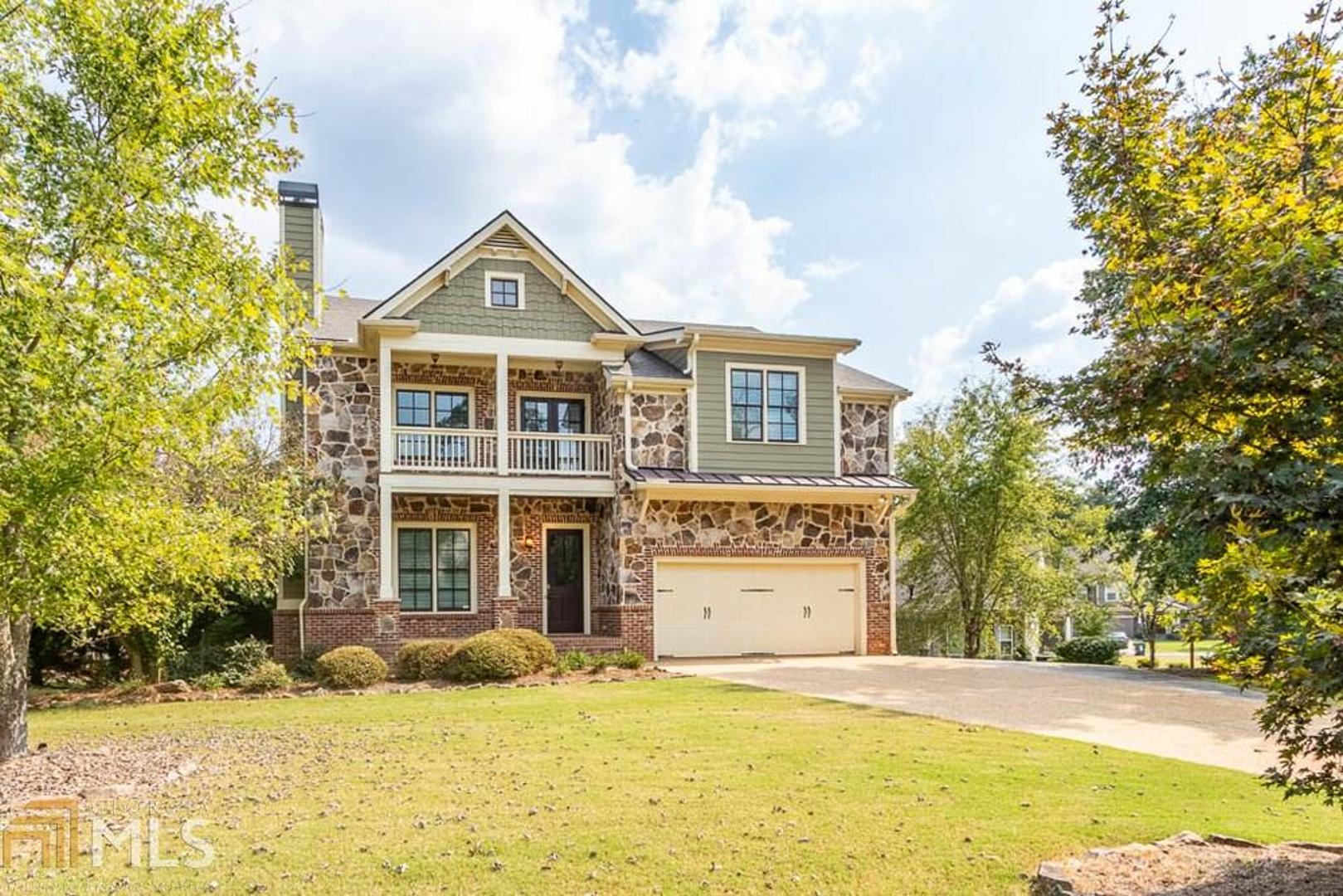 Say hello to your next home in the award-winning West Forsyth High School district! This 4BR/4.5BA brick-front, corner lot home features hardwoods on the main level and an open floorplan throughout. Upgrades include a brand-new roof and updated interior paint colors. The chefa???s dream kitchen includes stained wood cabinetry, stainless steel appliances, granite counters and a center island! The oversized Master BR features a walk-in closet and bathroom w/ walk-in shower and whirlpool tub. The backyard in-ground pool and basement media room are the perfect additions!