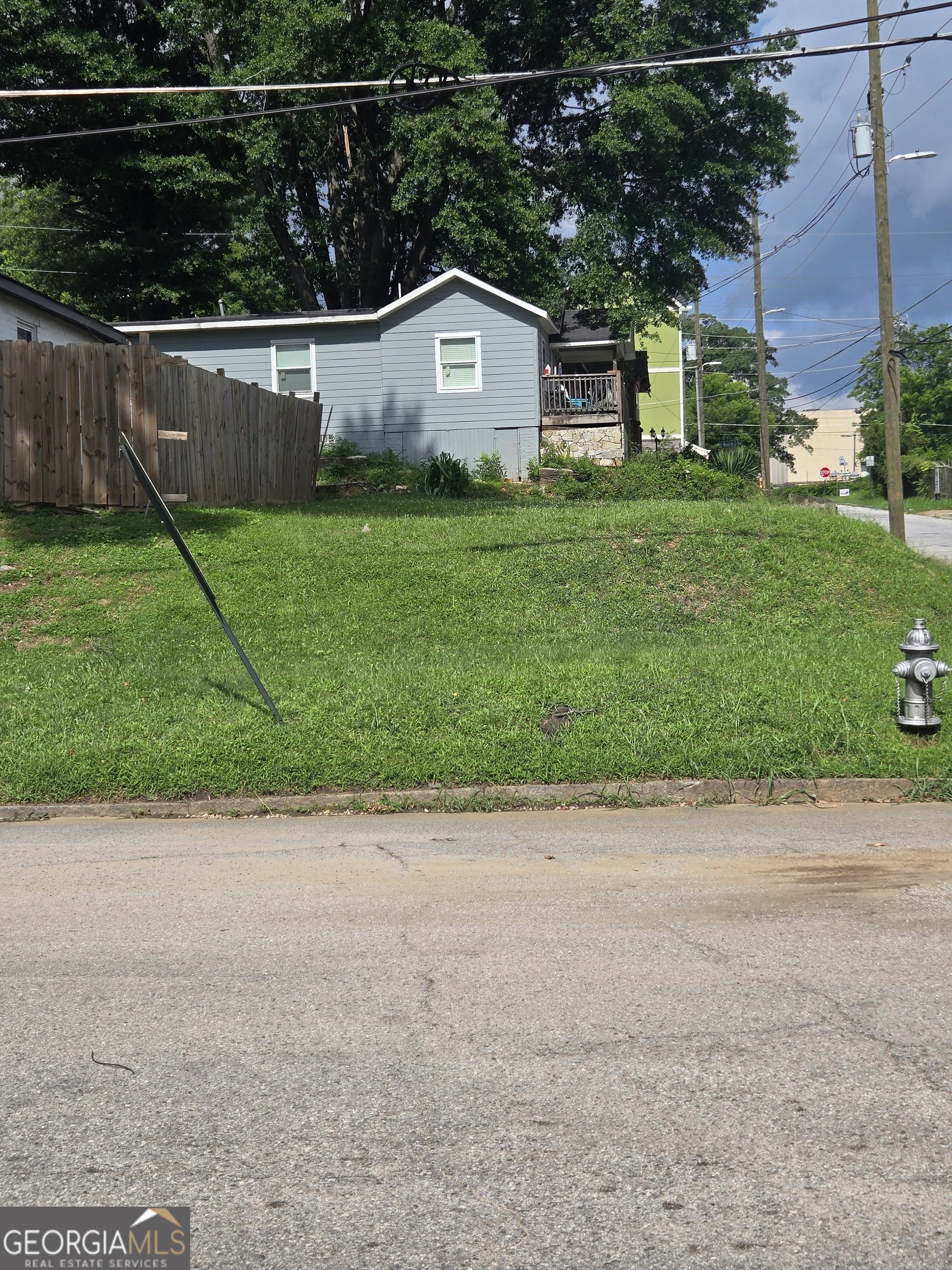 Unleash your vision in one of Atlanta's fastest-growing, opportunity-rich neighborhoods - Pittsburgh. This build-ready lot zoned R5 sits perfectly within a vibrant community known for its dynamic mix of historic charm and forward-thinking redevelopment. Surrounded by new construction and thriving redevelopment. Whether you're a seasoned developer, savvy investor, or future homeowner, this property presents a rare chance to contribute to the neighborhood's continued transformation. Moments from the Pittsburgh Yards 31-acre mixed-use project, two Beltline entrances, and the Beltline Westside Trail at Pittman Park. Minutes from the thriving Lee + White District, Mercedes-Benz Stadium, Summerhill, West End, and all major interstates (I-75/85/20). Easy access to MARTA, Georgia State University, Atlanta Technical College, and Hartsfield-Jackson International Airport. Whether you're looking to build a modern single-family home, a stylish duplex, or hold as a long-term investment, this lot offers the flexibility and potential to maximize future value. Seize this opportunity to establish roots or stake your claim in a neighborhood on the rise, where Atlanta's growth story is unfolding block by block.