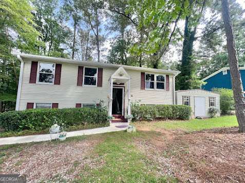 Experience all that Peachtree City has to offer in this charming 4-bedroom, 1.5-bath home! Perfectly located with easy access to the golf cart paths, this home offers both convenience and comfort. The spacious floor plan features a cozy living room, a practical kitchen, and four generously sized bedrooms. While the home could use a little TLC, it's an incredible opportunity to customize and make it your own. Don't let this chance pass you by!