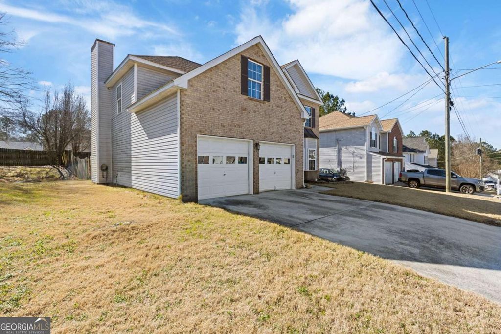 Photo of 7035 Red Maple Lane, Lithonia, GA 30058 (MLS # 10680161)