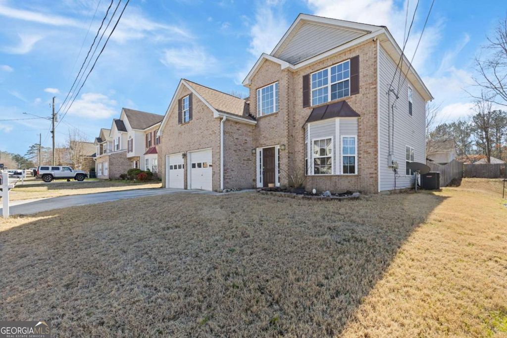 Photo of 7035 Red Maple Lane, Lithonia, GA 30058 (MLS # 10680161)