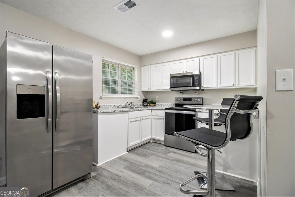 Photo of 6715 Kimberly Mill Road, South Fulton, GA 30349 (MLS # 10761442)