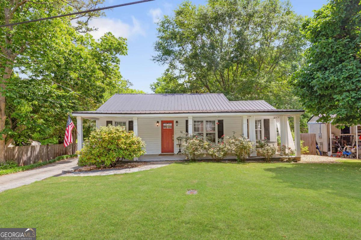 Cute as a button renovated home in the Bremen City Limits! This cozy three-bedroom two bath adorable and updated cottage is everything you need in the heart of Bremen. Tucked away on a quiet street but convenient to everything that Bremen has to offer. Located on a big flat lot, the huge, shaded backyard is perfect for entertaining.