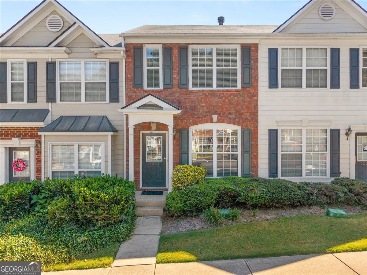 Discover this beautifully maintained 2-bedroom, 2.5-bathroom townhome for sale in Peachtree Corners, GA, located in the sought-after gated Hidden Cove community. This spacious residence offers an open-concept kitchen that flows seamlessly into the living room, complete with a cozy fireplace-ideal for entertaining or relaxing. Upstairs, you'll find two oversized bedrooms, each with its own private ensuite bathroom, providing comfort and convenience for homeowners or guests. The home features a mix of hardwood floors, luxury vinyl plank (LVP), and carpet, combining durability with modern style. Perfectly positioned for commuters, this townhome offers quick access to Jimmy Carter Boulevard, Peachtree Industrial Boulevard, and I-285, making travel to the city of Atlanta a breeze. With proximity to top retail, dining, and entertainment options, as well as parks and recreation, this home combines lifestyle and convenience in one desirable package. If you're searching for a townhome in Peachtree Corners with a gated community, open floor plan, and easy access to Atlanta, don't miss this opportunity in Hidden Cove.