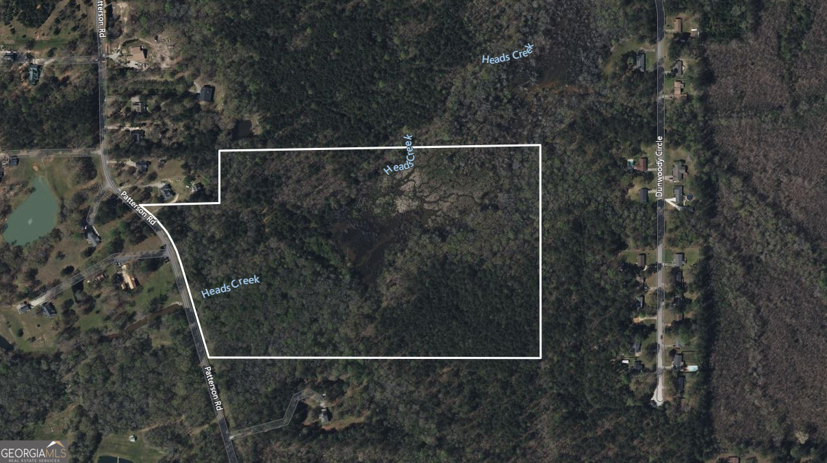 Motivated Seller! Beautiful 37 Acres in North Spalding County. Loaded with timber and hardwood. Over 770 ft of frontage on Patterson Rd. Heads Creek runs through middle of property. Very convenient to town. Easy access to Hwy 19/41. Several build sites. Excellent place to homestead, build your dream home.