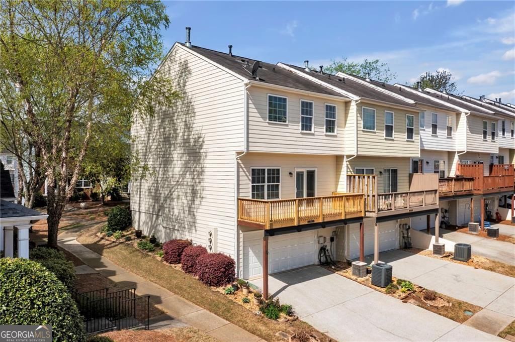 Photo of 614 Market Place Lane, Woodstock, GA 30188 (MLS # 10791561)