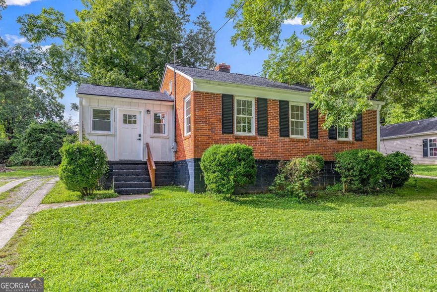 Charming Brick Cottage in the Heart of Cornelia - $215,000 a beautifully remodeled 2BR,1Bth brick home that blends timeless charm with modern upgrades. Perfectly situated just minutes from downtown Cornelia, this cozy residence offers convenience, comfort, and character. New roof, windows, and water heater for peace of mind, Stylish kitchen with brand-new appliances and cabinetry, open dining/living combo, Mud room laundry area, Carpeted floors, and kitchen level parking