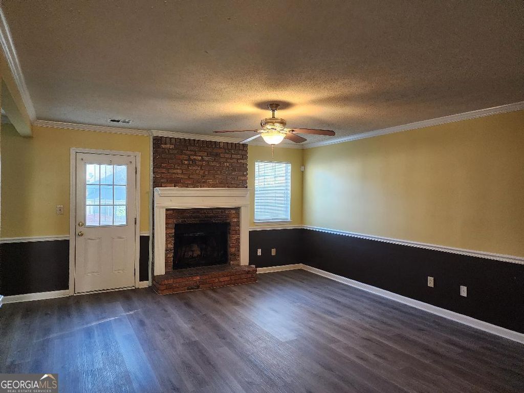 Photo of 8306 MOUNTAIN PASS Pass, RIVERDALE, GA 30274 (MLS # 10715527)