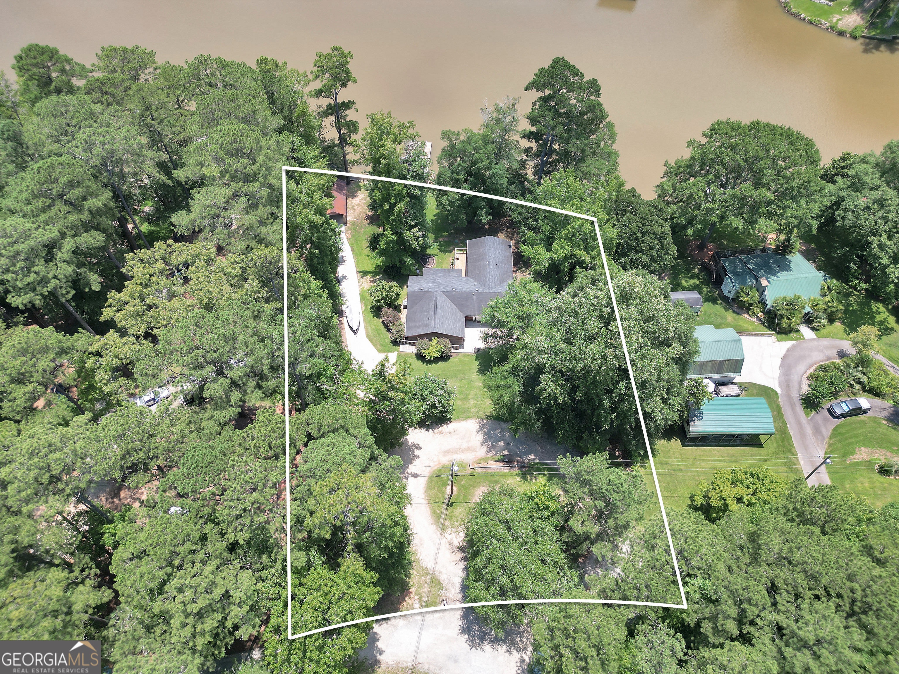 Seller is giving $15,000 concession to use towards Closing Cost or Upgrades. Exclusions may apply. HUGE PRICE REDUCTION !! Motivated seller ! Welcome to Lake Life ! DEEDED PROPERTY! Over 150 Ft of waterfront, Floating dock, Stationary Dock to enjoy that Lake Life. Concrete Boat ramp with Cover. Huge Yard to die for and to hold the family gatherings. As you look up to the house you will see a Nice size deck to grill on and a screened in porch to watch the fun. Out back on the road side you have a U shaped driveway also with a poured driveway down to the boat ramp. 600 sq ft workshop to store anything you like. Also you have Covered carport to cover your lawn equipment. As you make your way to the home you will see a nice ramp that goes down to a concrete patio which has separate entrances that can go into the home itself and also into an in-law suite. Inside you will find a huge family room that is as cozy as you can get, Wood/pellet stove to heat up those cold evenings. Take a step down to the Dining room and you will see a Cute Country kitchen island. 3 bedrooms 2 1/2 bathrooms and in-law suite that makes this home really a 4 bedroom for those parents or grown kids that want to be on their own but not quite old enough to leave! Come on by and see the Views and what this home has to offer! Ask how you can receive up to $2500 credit by using one of our preferred lenders. Exclusions may apply.