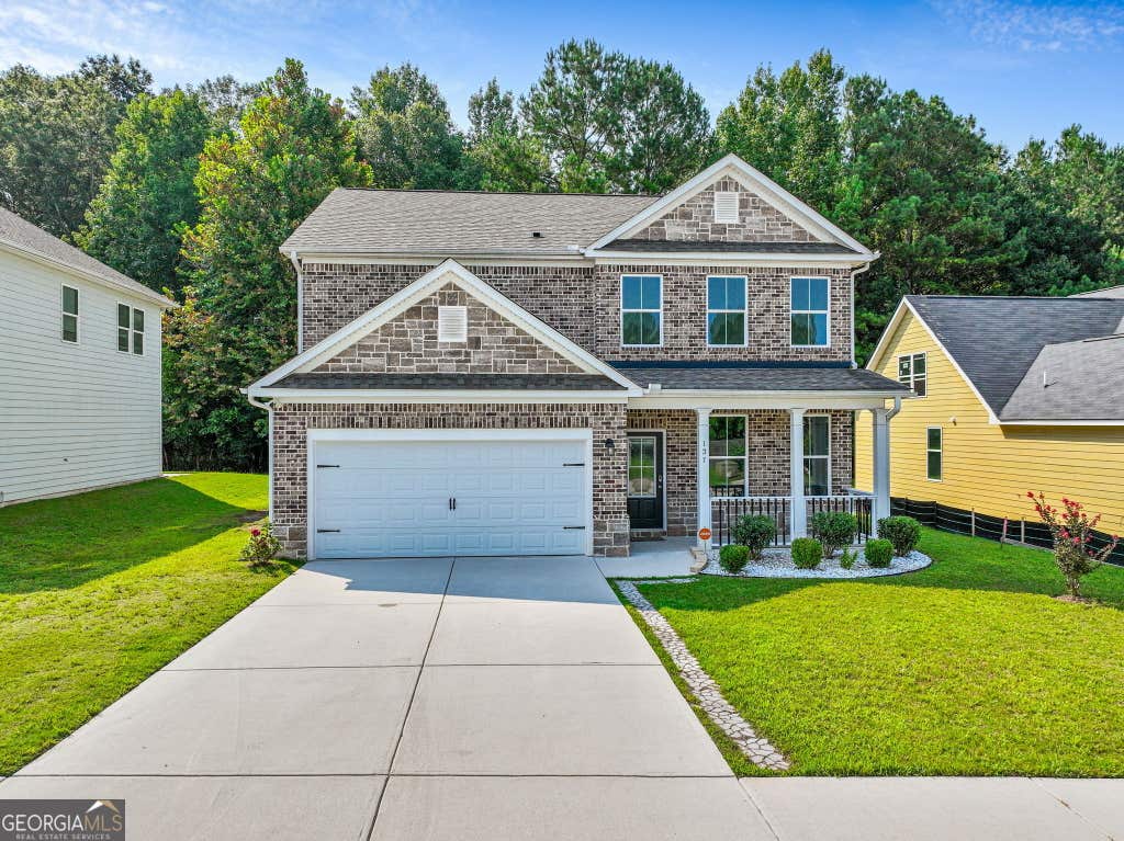 Photo of 137 Hunts Mill Circle, Griffin, GA 30224 (MLS # 10817495)