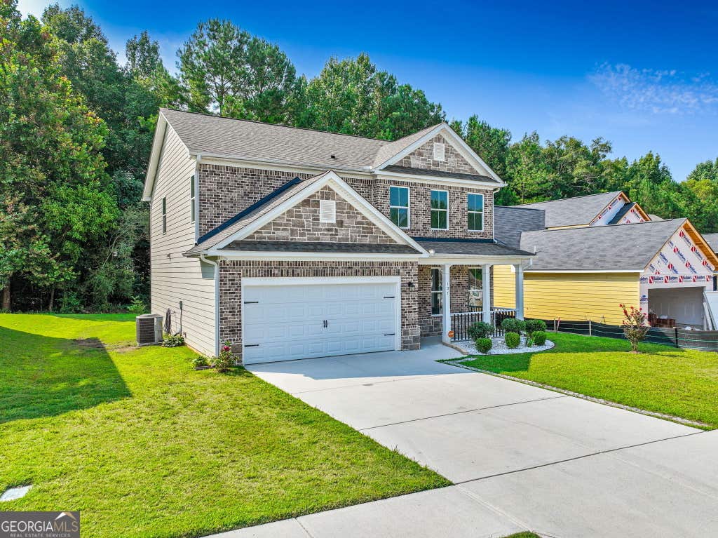 Photo of 137 Hunts Mill Circle, Griffin, GA 30224 (MLS # 10817495)