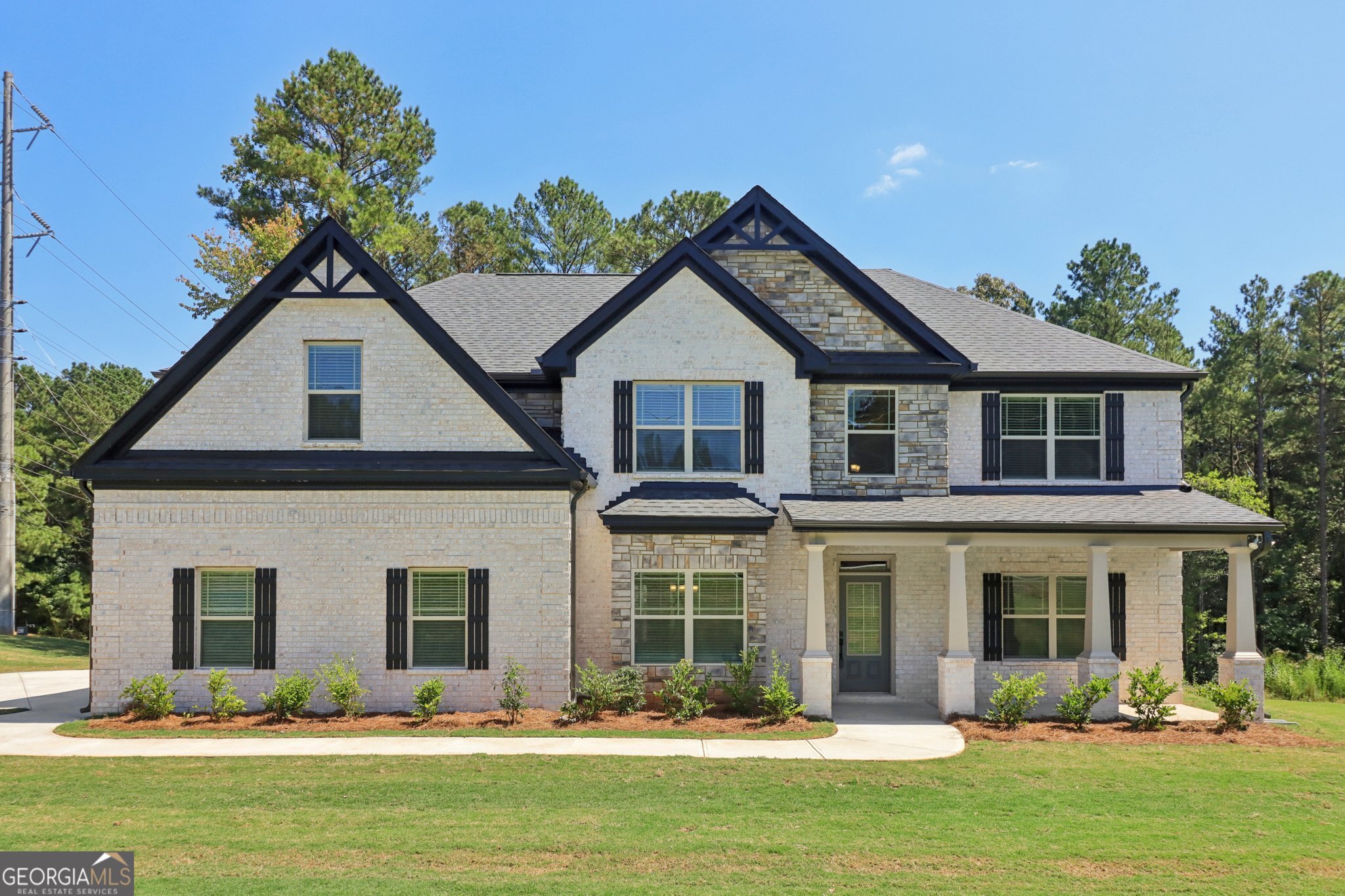 Another quality built home by Sun Rise Brothers Properties LLC. The Kenneth B Plan featuring 5 bedrooms and 4 baths. Owners suite located upstairs boasts a large sitting area and spa inspired ensuite bath with large shower and soaking tub. Secondary bedrooms have access to 2 additional bathrooms on the upper level. Main level offers a formal living room and formal dining room. Spacious, chef inspired kitchen has all you need. Great room overlooks the large back yard. One bedroom on main level with bathroom access is perfect for guest or an office. Enjoy the large back porch that has 2 ceiling fans to keep you cool on those warm evenings! All of this close to all McDonough has to offer and located in the Ola School District.