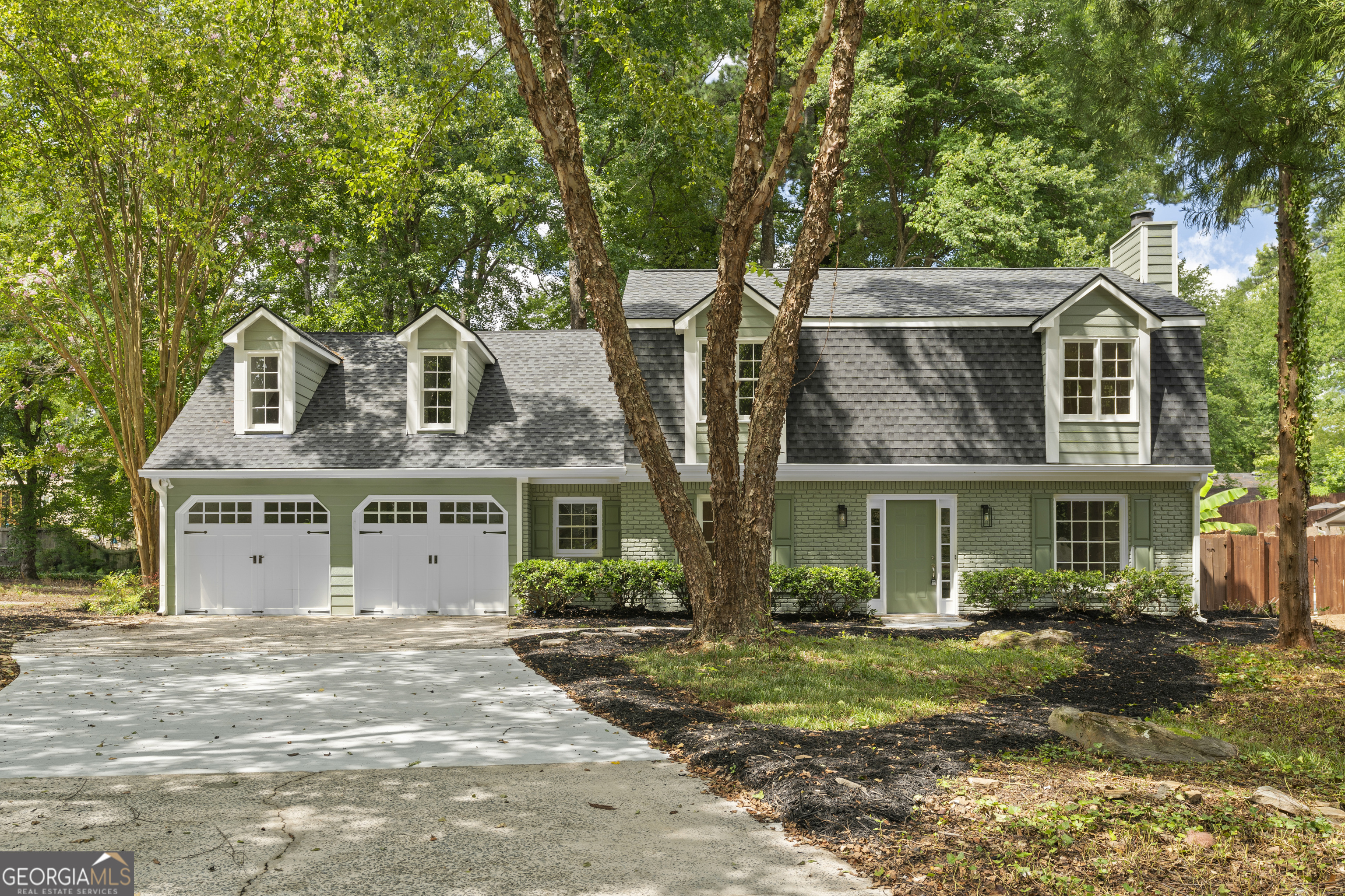 Welcome to this beautifully updated 4-bedroom, 2.5-bath home in the sought-after Saddle Ridge Lake community, a swim/tennis neighborhood offering fantastic amenities. This move-in ready property features a brand-new roof and water heater for peace of mind. Inside, the bright and inviting layout boasts fresh paint, elegant trim work, and spacious living areas. The updated kitchen offers stainless steel appliances, a subway tile backsplash, and plenty of cabinet space, opening to a sunny breakfast area. The family room centers around a cozy fireplace, creating the perfect spot for gatherings. Upstairs, a large bonus room provides endless possibilities-ideal for a media room, playroom, or home office. The owner's suite includes a luxurious bath with double vanities and contemporary finishes. Step outside to an expansive patio overlooking a private, wooded backyard, perfect for entertaining or relaxing. Complete with a two-car garage and a prime location, this home blends comfort, style, and convenience.