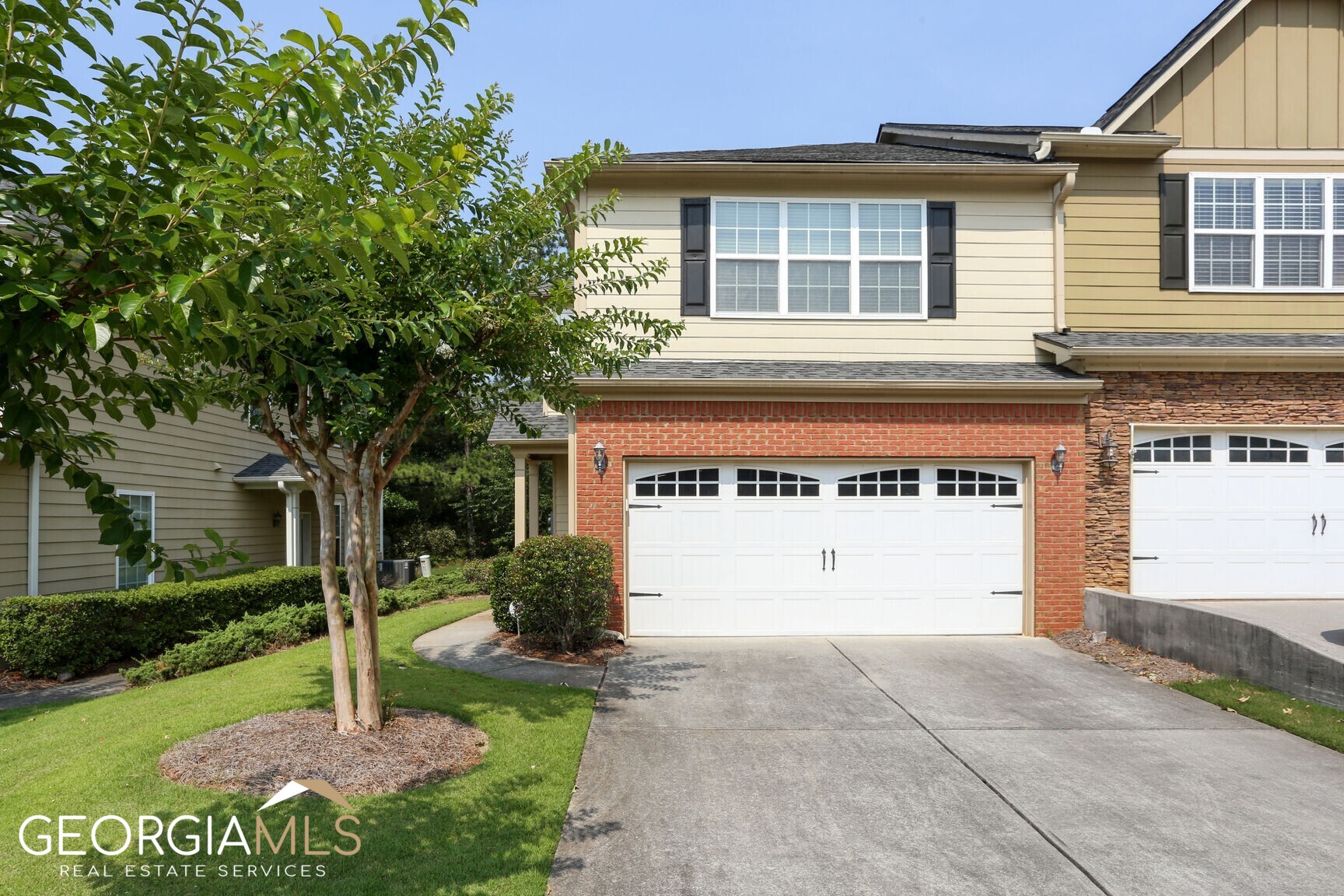 Welcome to Hickory at Shiloh! This open and cheerful light-filled end unit is neutral and move in ready! Features include a large driveway; two car garage; side entry walkway, and rear private patio. The main floor has gorgeous plank flooring; open concept living room and kitchen; large walk-in pantry, and ample storage under the stairs. The upper floor has a functional loft space along with 3 generous bedrooms; and a large laundry room. This end unit has wonderful natural light! Conveniently located near hwy 75; Kennesaw State University; shops and restaurants! Sidewalks and street lights make for pleasant walks! Summer is here; enjoy the community pool which is nearby! Welcome home!