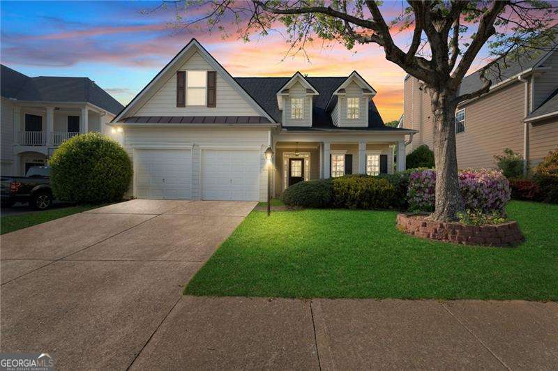 Step into this inviting two-story foyer home, creating a warm and cohesive space. The heart of the home is the spacious open-concept family room, anchored by a cozy fireplace and flanked by large windows that fill the space with natural light. Whether you're entertaining guests or enjoying a quiet evening, this room offers the perfect ambiance. The gourmet kitchen has been thoughtfully renovated with granite countertops, stained cabinetry, and stainless steel appliances. A breakfast bar and casual dining area offer everyday comfort, while the formal dining room is ideal for special gatherings. Primary suite on the main level provides convenience and privacy, featuring a tray ceiling, walk-in closet, and an en suite bath complete with double vanities, a soaking tub, and a separate tiled shower Co your private retreat after a long day. Upstairs, you'll find three generously sized secondary bedrooms, each with ample closet space and access to two additional full bathrooms Co perfect for family, guests, or even a home office setup. Enjoy the outdoors on the oversized back deck that overlooks a private, fenced-in backyard Co great for relaxing, entertaining, or letting pets and kids play freely. Come check it out!