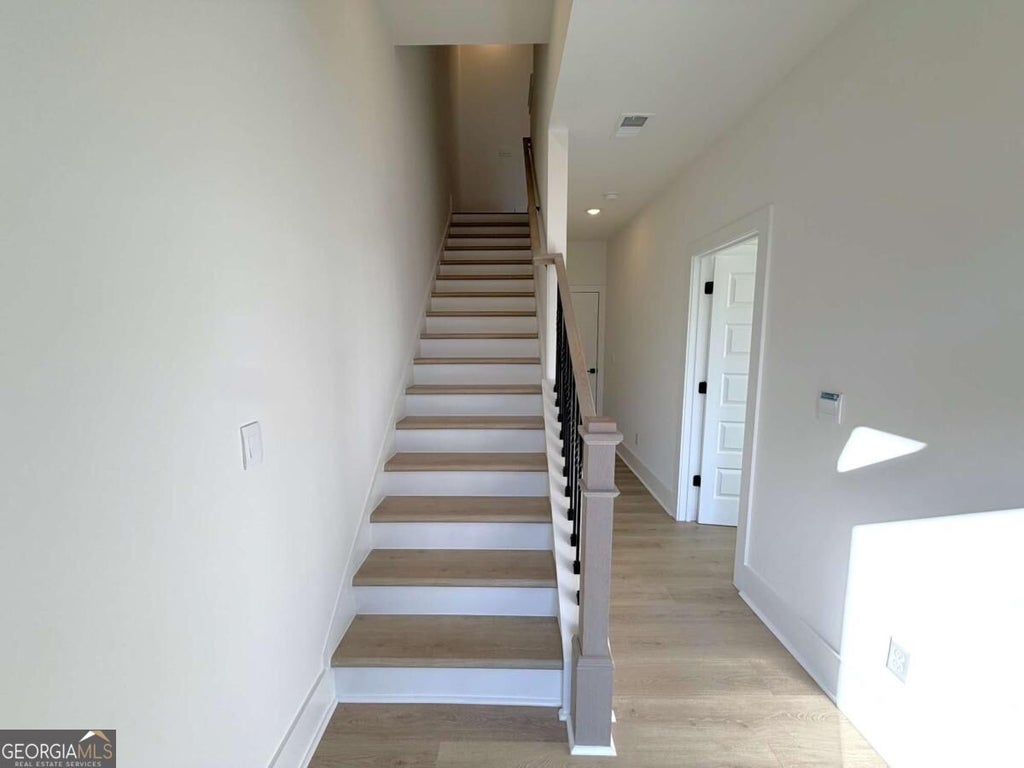 Photo of 5631 Peach Orchard Trail, Peachtree Corners, GA 30092 (MLS # 10878435)
