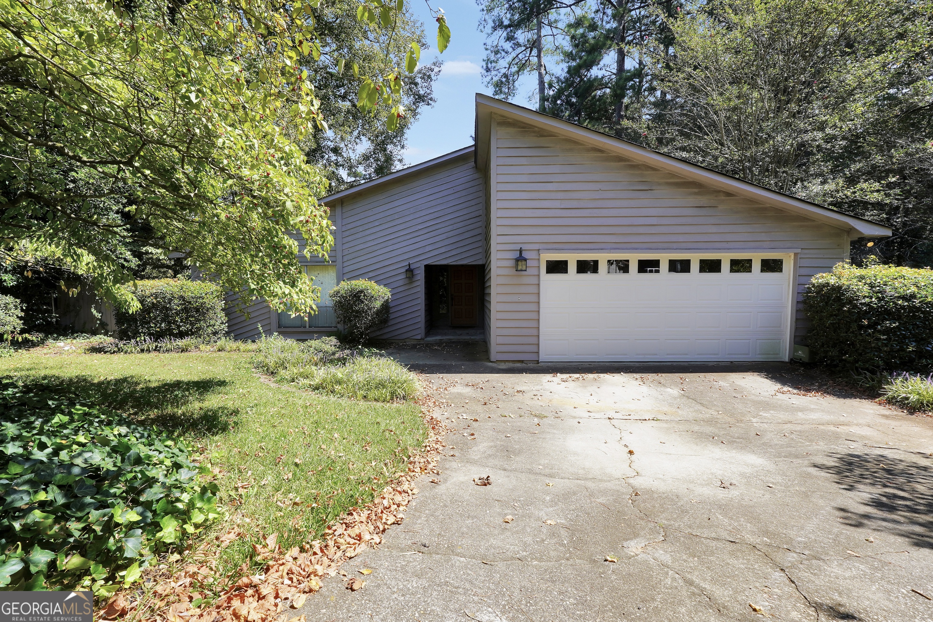 This adorable 4 bedroom, 2 bathroom home in the Wesley Park subdivision is tucked away on a quiet cul-de-sac. A brand-new HVAC system has already been installed, leaving only cosmetic updates to make it your own. Inside, you'll find a spacious primary bedroom and a large living room with a striking stone fireplace, perfect for gatherings. Screened in back patio and quiet, private backyard perfect for relaxation. With solid structure and plenty of potential, this home is a great opportunity to add your personal touch and build equity. Don't miss out-schedule your showing today!