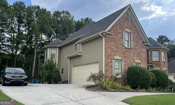 Photo of 2088 Alcovy Shoals Bluff, Lawrenceville, GA 30045 (MLS # 10840831)