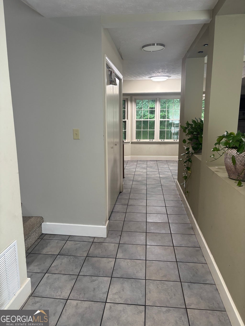 Photo of 1966 Kensington High Street SW, Lilburn, GA 30047 (MLS # 10807868)