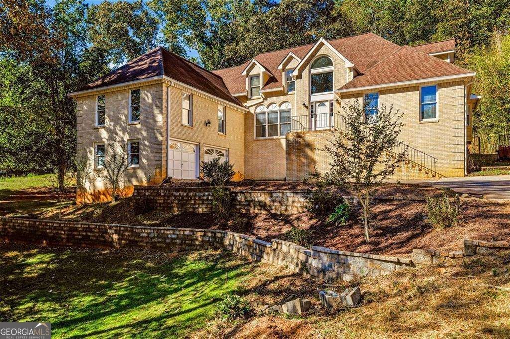 Photo of 609 Apache Trail, Woodstock, GA 30189 (MLS # 10877311)