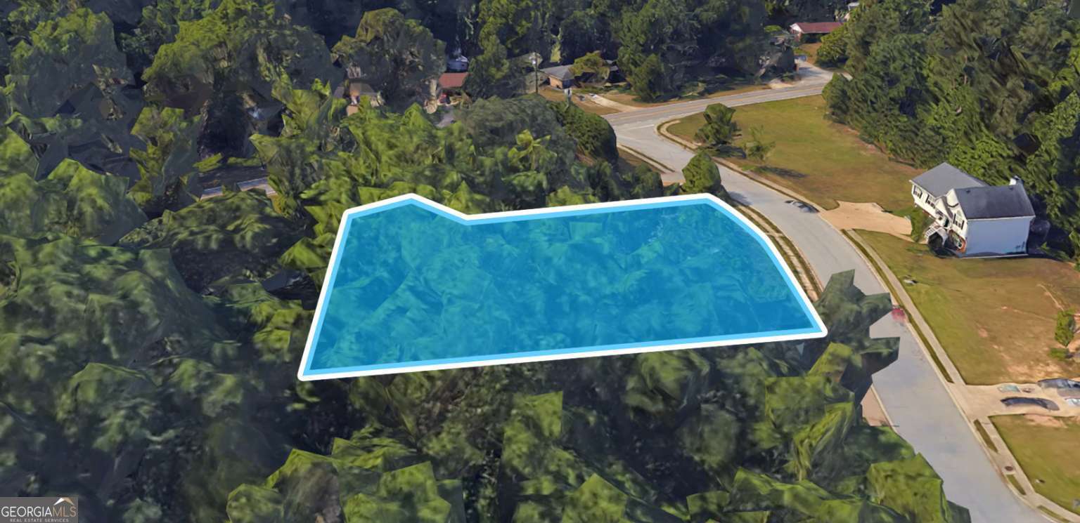 This 2.62-acre residential lot in Douglasville, GA is ideal for building a custom home, creating a private retreat, or holding as an investment property. Located on Terrace Mill Dr, the lot offers paved road access and is conveniently close to schools, shopping, and parks. The lot is level, offering a straightforward build site with some wooded areas for privacy. The property is in a growing suburban area with easy access to Atlanta, making it an excellent investment for future growth. Owner financing is available, making this an affordable opportunity to build your dream home.