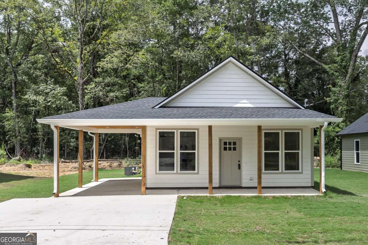 Be the first to live in this brand-new 3-bedroom, 2-bath home in a peaceful setting! This thoughtfully designed property features an open floor plan, a covered carport, and a level yard for easy maintenance. The kitchen comes equipped with stainless steel appliances and total electric utilities for efficiency. The master suite includes a spacious walk-in closet and a bathroom with double vanities. Enjoy modern finishes, a fresh neutral color palette, and the comfort of all-new construction. Conveniently located near Burnett Ferry and Alto Park, you'll have quick access to local schools, shopping, and dining-while still enjoying a quiet, relaxed neighborhood feel.