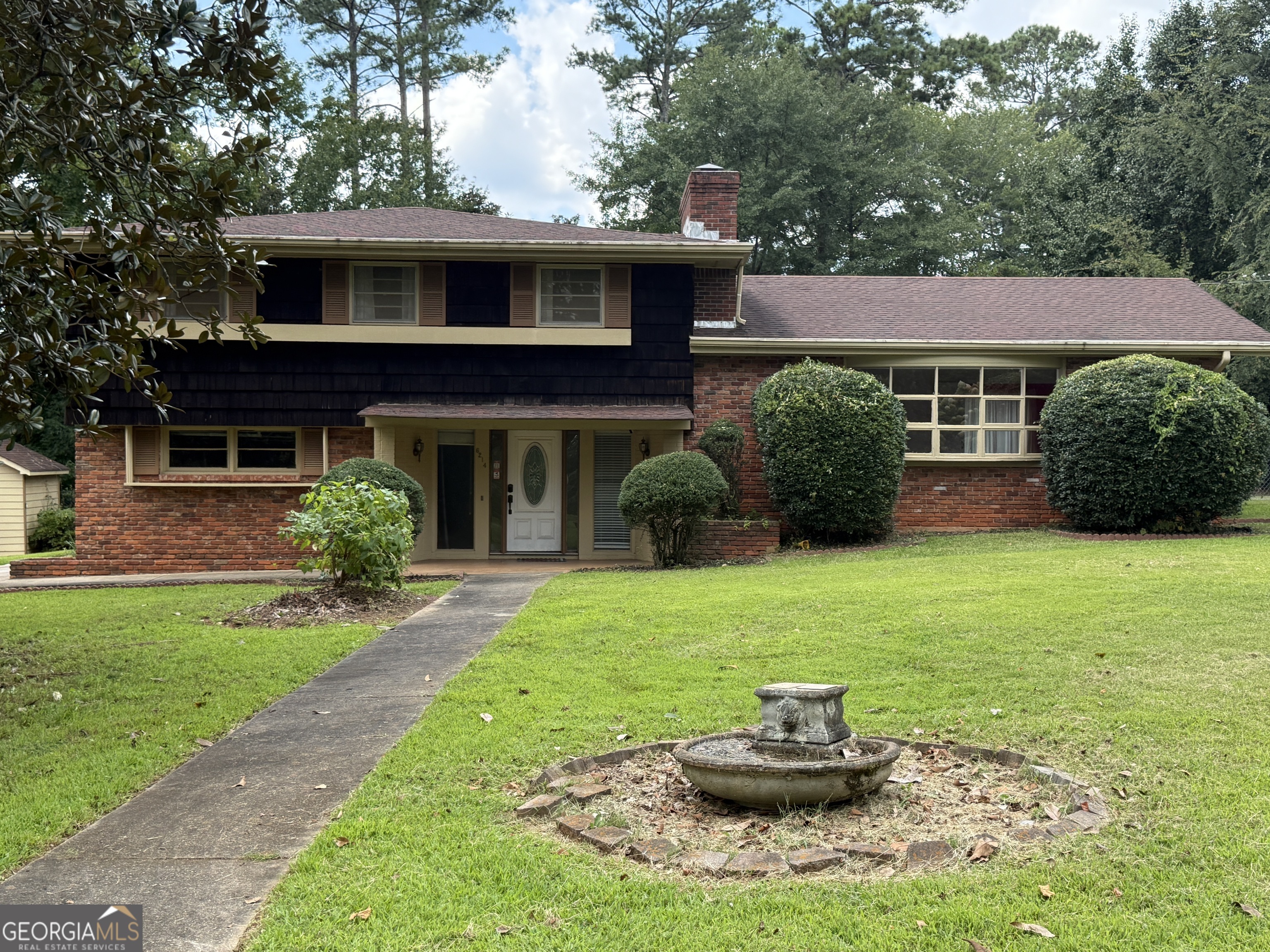 Built in 1962, this isn't just a house - it's a piece of history, perfectly preserved and absolutely bursting with character! Nestled on a sprawling .88-acre corner lot in a truly coveted neighborhood, you'll feel like you've stepped into a dream. With a generous 3,158 square feet, this beauty boasts 5 bedrooms and 3.5 bathrooms, offering an abundance of space for everyone to spread out and thrive! But the real showstopper? An incredible, handicapped-accessible in-law suite! This isn't your average add-on - it features its own separate entrance, extra-wide doors, a step-free, HUGE shower, and an expansive toilet room, making it perfect for multi-generational living or even a fantastic rental opportunity! Step outside and prepare to be wowed by the expansive, fenced yard - your private oasis for outdoor adventures, lively gatherings, and endless fun! And the location? Unbeatable! You're just moments from the vibrant Covington Square and Legion Field, putting all the best local attractions and amenities right at your fingertips. Don't let this unique Mid-Century Modern gem slip through your fingers! It's more than a home - it's a lifestyle!