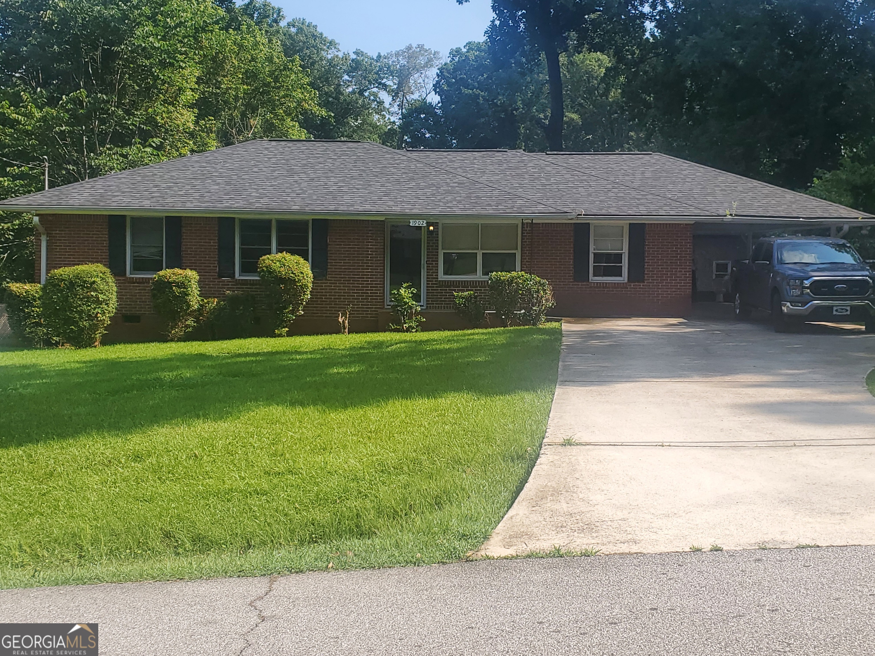 Recently updated 4 sided brick ranch. Floorplan is open and flows well. The home has new interior paint, new LVP in the kitchen, dining room and living room. Original hardwood in the hallway and all bedrooms. Tile in the bathrooms. New light fixtures. New deck. Large, level front and back yards. Carport that fits 1 vehicle, driveway fits 2 more. Established community with character. It's ready for you, come on by!!!