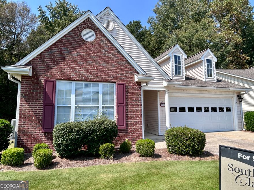 Welcome to this beautifully maintained 3-bedroom, 2-bathroom home in a desirable 55+ community. Situated on a scenic greenbelt lot overlooking the golf course, this property offers both privacy and stunning views.  Step inside to find an inviting great room with a cozy fireplace, perfect for relaxing or entertaining. The adjoining dining room flows seamlessly into the updated kitchen, complete with modern finishes and ample cabinetry. A bright and airy sunroom provides the perfect spot to enjoy your morning coffee while taking in the tranquil surroundings.  The home features vinyl plank flooring throughout, combining style with low-maintenance living. The fenced backyard is ideal for pets or outdoor enjoyment, while the 2-car garage with built-in storage shelves offers plenty of space for organization.  Residents enjoy peace of mind knowing that the exterior of the home is maintained by the HOA, allowing more time to enjoy the community amenities and lifestyle.  This is the perfect opportunity to own a thoughtfully designed home with golf course views in a welcoming, active-adult neighborhood. Braelinn Golf Club is just steps away.The entire home has been freshly painted. Architectural shingled roof is less than 1 year old. Sprinkler system. Greenbelt lot.