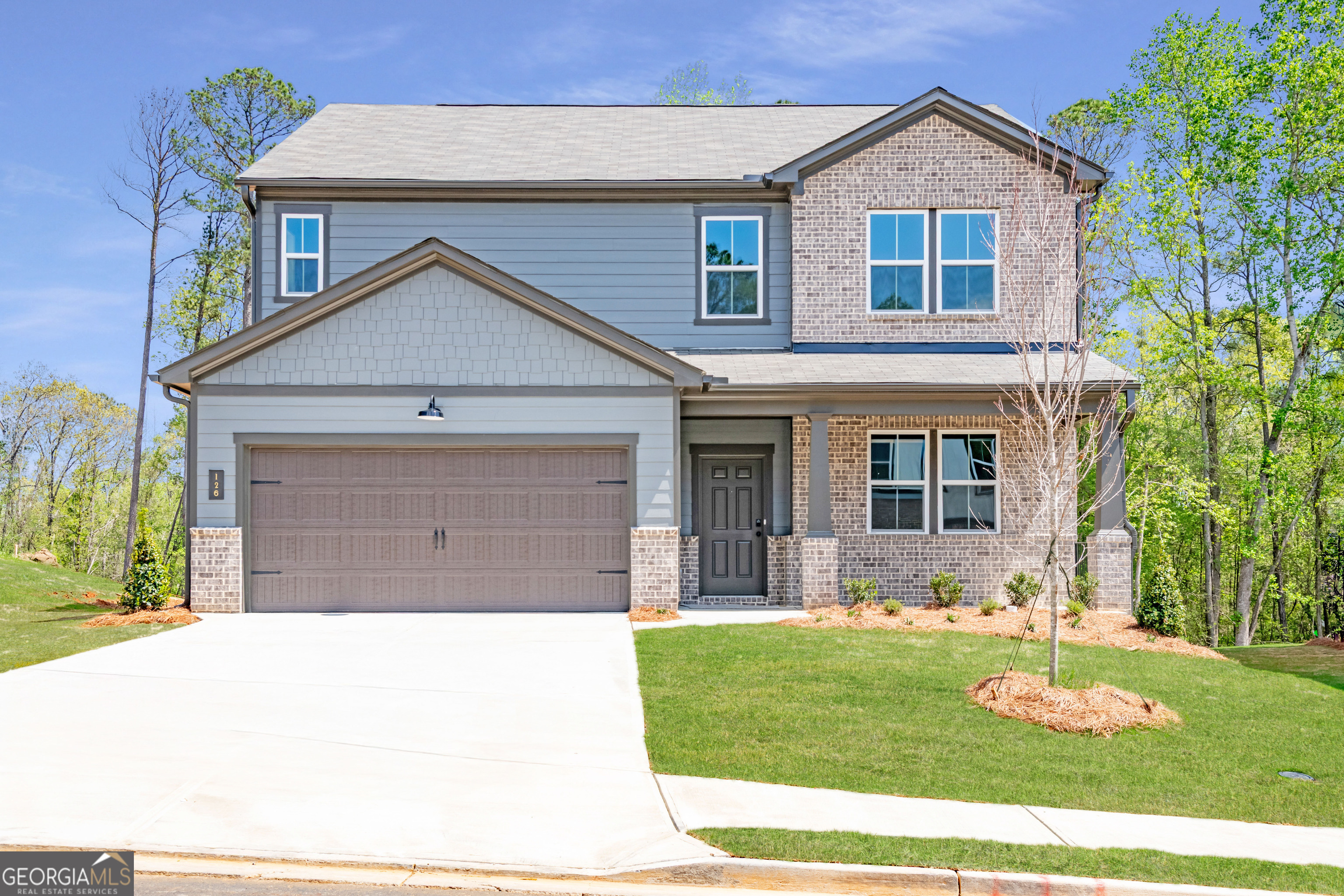 Welcome to our beautiful Jasper floor plan, with charming Arts & Crafts exterior, located in the heart of the Bridge Mill area in Canton & built by Beazer Homes. This spacious 4BR/2.5BA home offers ample space for very comfortable living. The 2666 sq ft layout includes a spacious family room, modern kitchen and large study on the main level. The primary suite has generously sized walk in closet, while the additional bedrooms and 2nd floor loft provide plenty of room for family and guests. Step outside to enjoy your covered porch on the .193-acre lot, perfect for entertaining or relaxing. Unique highlights - community includes view of Blue Ridge Mountains! Located in the desirable Bridge Mill area, close to Lake Allatoona, world class shopping, restaurants, parks, & schools, making it an ideal choice for those seeking convenience and comfort. Beazer Homes is proud to be America's #1 Energy-Efficient homebuilder. In 2024, our homes achieved an average net HERS score of 37 (including solar) and a gross HERS score of 42-the lowest publicly reported scores among the top 30 U.S. homebuilders identified by Builder Magazine's Top 100 list (ranked by 2024 closings). Take advantage of our special buyer incentives which may include applicable lower rate program, closing costs, design studio upgrades, FLEX dollars, and more. Contact us today to learn more about how you can benefit from these exclusive offers. Photos are of a similar Jasper home