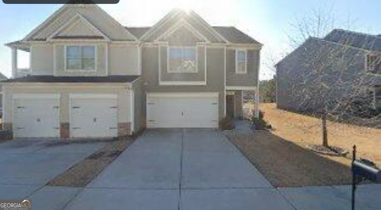 Conveniently situated just 5 minutes from I-20 in the sought-after Brookmont subdivision of Douglasville, Georgia, this spacious four-bedroom, two-and-a-half-bathroom townhome combines comfort with modern elegance. The kitchen boasts granite countertops and stainless steel appliances, including an electric range, microwave, refrigerator, and dishwasher, that flow seamlessly into the inviting family room adorned with a gas starter fireplace-ideal for cozy gatherings. Updates include new tile floors downstairs, a stylish kitchen backsplash, a newly installed storm screen door at the back, and a two-car garage. Upstairs, discover four bedrooms, two full baths, and a practical laundry room. Enjoy community perks like two clubhouses, pools, tennis courts, a basketball court, and gyms. This townhome offers an exceptional living experience and is a must-see property. Security deposit and first month's rent due at signing.