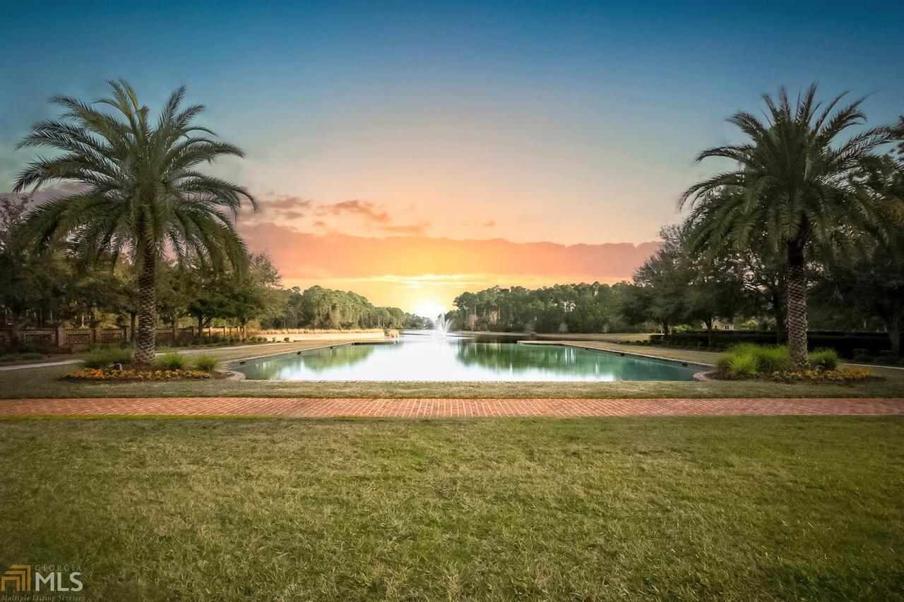 This is a Beautiful Nature Site that backs up to a small lake. There you will see lots of nature birds. The lot is nicely treed and would make a great build site for your Coastal Home. Cumberland Harbour is gated and manned 24 hours and is an 1100 acre maritime community with lakes, marsh, deep water and oak and pine hammocks throughout with beautiful ammenities to enjoy with 3 swimming pools, 6 tennis courts, pickle ball court, fitness center, playgrounds, fireplace gazebo, nature trails and a gorgeous park that looks out to Cumberland Island and the Atlantic Ocean. Cumberland Harbour was rated the top 100 communities by Ideal Living. Call today for your tour.
