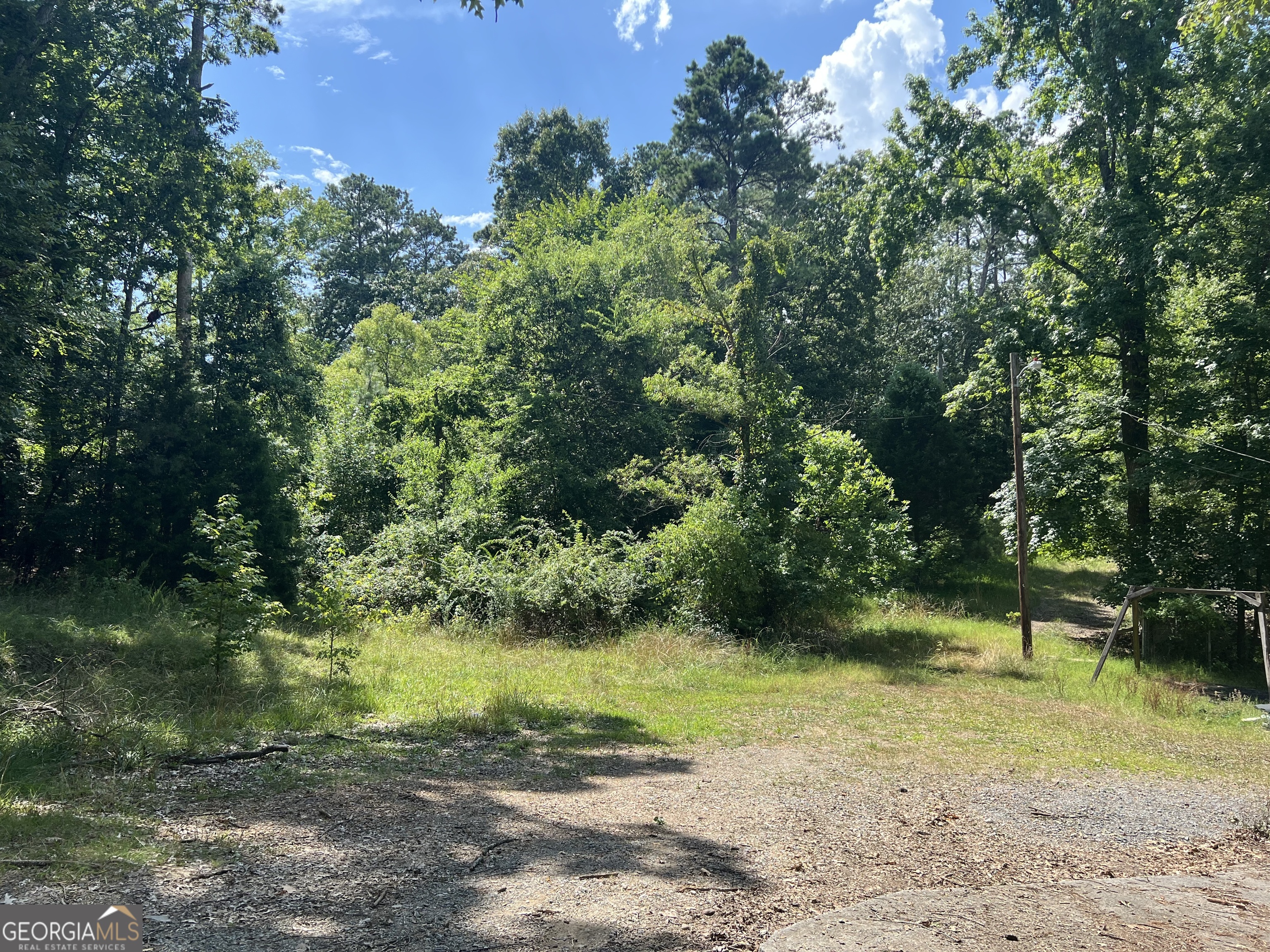 Discover the perfect opportunity with these 5 connected building lots, 3 have 180 ft *- road frontage on Wilkerson and two have road frontage on the undeveloped Beverly Road, offering plenty of space and potential. These lots are in a great location and are perfect if you're planning to build your dream home or just want to invest! One lot has a old mobile home that has had utilities in the past making it easier for your future development. *DO NOT ENTER THE MOBILE HOME* Buyers will need to conduct their own inspections during the due diligence period. No mobile homes allowed. Selling AS-IS