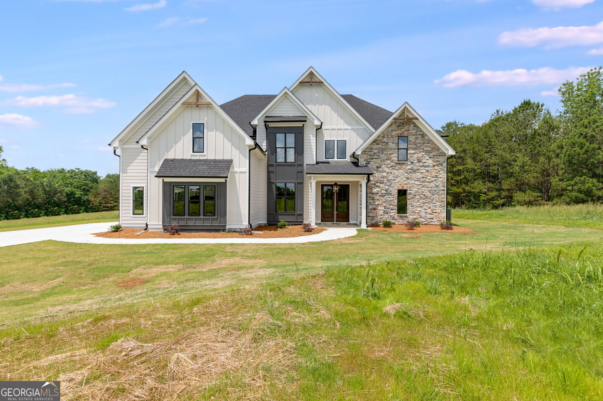 NO HOA ON BEAUTIFUL PROPERTY IN NORTH HARALSON COUNTY! This is a beautiful home on some gorgeous land that you will be blow away by! The Meadows at Lake Circle is located in a stunning area of Haralson County known as The Flat Woods Community. It's convenient to I-20, Hwy 120, Rome, Carrollton and the surrounding small towns. This home has something that everyone will love. Owner's Suite on MAIN LEVEL with absolutely stunning appointments. Formal Dining Room, Wood Floors, Two-Story Family Room with wood burning fireplace with floor to ceiling stone work. Huge Kitchen with Central Island and THOR COMMERCIAL GAS RANGE and decorative vent hood, designer countertops and lighting to die for! Upstairs there are 3 secondary bedrooms, 2 full baths, OFFICE and a nice BIG BONUS ROOM/LOFT. Covered back patio will be your haven to take in the wild life and serenity of the country side. Spray Foam Insulation in the attic, Zoned HVAC, Smart Home Package Equipped and Superb 1-2-10 Warranty (10 year structural warranty) and NO HOA! This is one that you're going to wanna sell your house to purchase!