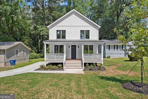 Photo of 1413 Kennesaw Drive NW, Atlanta, GA 30318 (MLS # 10615414)