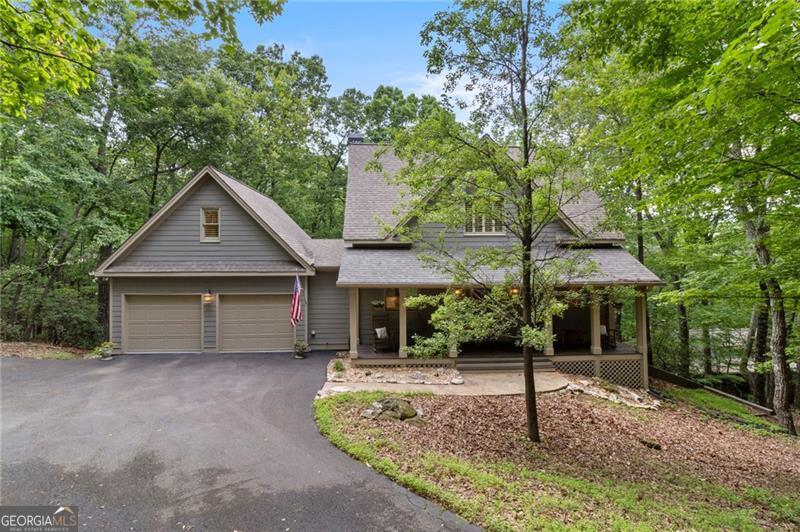 Beautifully designed and very well maintained 5 BR - 4 1/2 Bath design home with open floorplan located in a tranquil setting with seasonal mountain views. High volume ceilings with 2 rows of large picture windows, hardwood flooring and stacked stone fireplace in the great room. Beautiful granite countertops and updated appliances in the kitchen. There is a (4th BR) located over the garage with interior access as an added bonus. The terrace level offers a newly completed addition which includes a 5th bedroom with full bath access, an oversize family room and game room with vinyl plank flooring throughout. A tremendous value that is an absolute must see with anytime access.