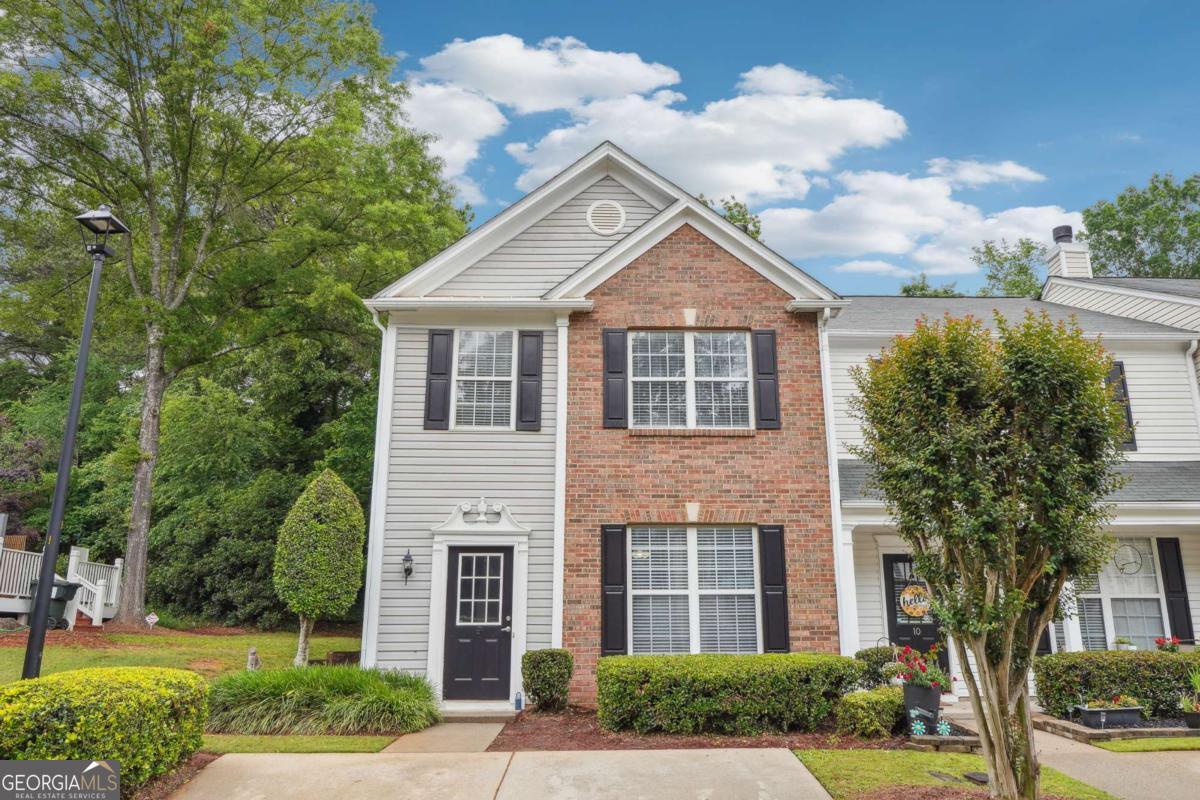 Open house Saturday June 7th from 2-5 pm. Location! Location! Location! This beautiful updated end unit townhome is in a prime location, easily accessible to Alpharetta, Johns Creek, and Roswell. The main level features an updated kitchen open to the family room, eating area, and half bath all with laminate, hardwood flooring. Upstairs you will find a spacious primary bedroom with a vaulted ceiling and primary bath including a double vanity and walk-in closet. There are also two secondary bedrooms with aa secondary bathroom as well as a laundry closet with washer and dryer. All of the interior was just freshly painted. Outside the back door is a private, relaxing patio and backyard area overlooking a beautiful tree filled wooded area. Roof is less than one year old. Additional visitor parking spots for guests are just a short walk away. No rental restrictions. Great schools! Located just minutes from shopping, parks and recreation, schools, highways, restaurants, and more!