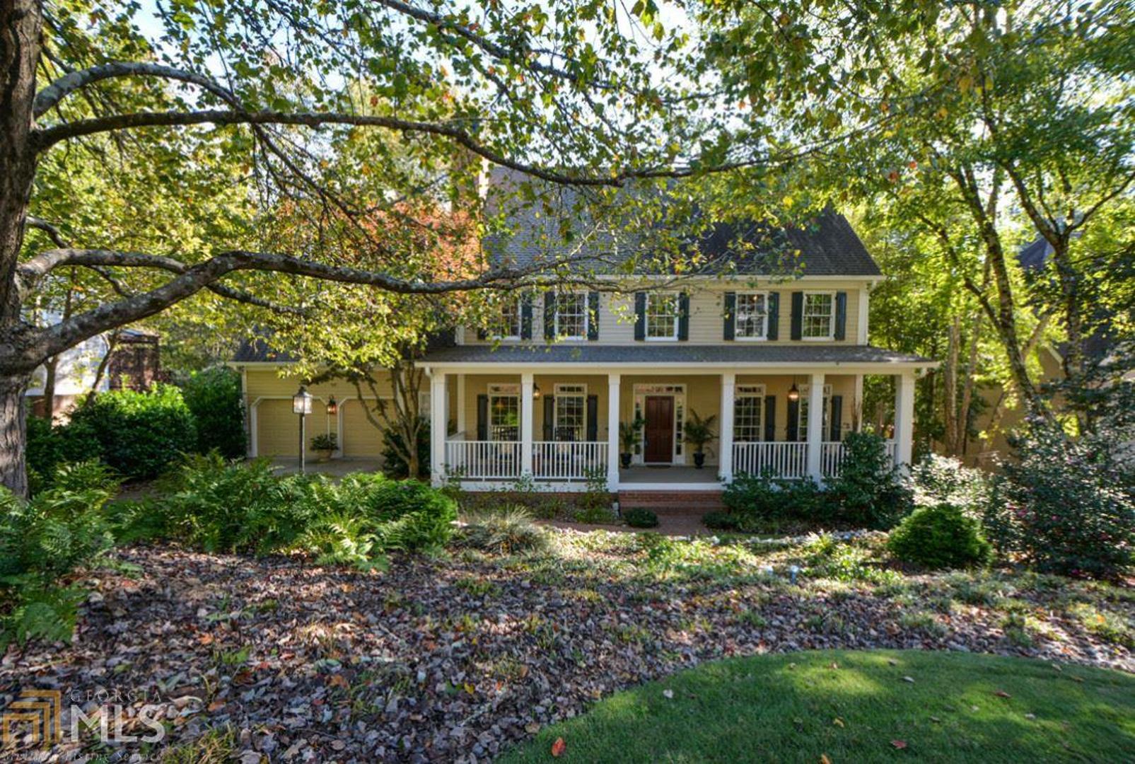 Space, Space, Space, this Spacious custom built home located in Eagle Watch has the most square footage for the money! Five bedrooms and four baths, including a guest bedroom and full bath on the main level. Private back stairs lead to a bonus room that could be used for an office or virtual learning classroom. Full finished basement and bath would be perfect for in-law suite, teen suite and second home office. This home features two rooms that could serve as offices plus an additional virtual learning space. Recent updates to this fine home include exterior painting, garage door and openers, gutters, HVAC system, stainless kitchen appliances, master bathroom, guest bathroom, and laundry room. Come sit on the oversized front porch and gaze at your professionally landscaped front yard or sit on the back deck and view your wooded Corps of Engineers property private oasis. Lake Allatoona is a short walk away from your back gate. There is space and square footage galore in this beautiful southern style home. Lower level has two sets of french doors that lead to you private patio . It is move-in ready and all major appliances and systems have been updated. A generous decorating allowance helps you make this home your own.