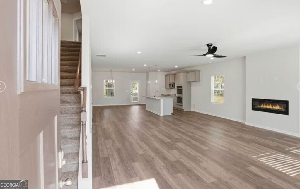 Photo of 1555 Sungrown Way, McDonough, GA 30253 (MLS # 10760111)