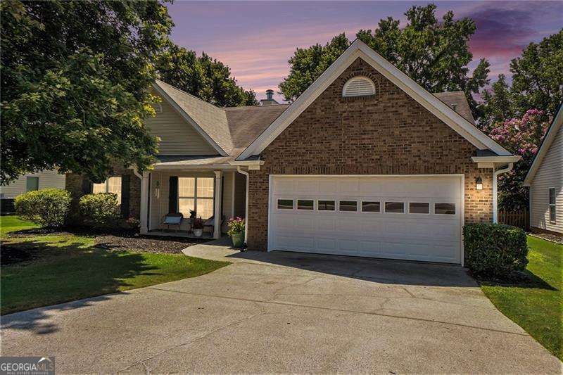 Incredible price for Cobb County - move right into this spacious ranch home!! White kitchen w/ newer stove, granite counters, island, and eat-in breakfast area. Family room w/ vaulted ceilings plus fireplace and built-ins. Formal dining room presently used as an office/sitting area. Additional living room spans the backside of the home - perfect for a reading nook, home office area, playroom, home gym, bar / entertaining area, even a pool table. Master bedroom has vaulted ceilings, walk-in closet, and plenty of space for furniture. En-suite bath offers dual vanities, water closet, plus separate tub and shower. Secondary bedrooms offer ample closet space and share a cute little hall bathroom. Recently replaced HVAC, water heater, and gutters. Private backyard with patio is ready for grilling out and relaxing on the weekend. Quiet neighborhood with pool is located close to downtown Kennesaw and downtown Acworth, and just minutes from I-75 Expressway access. LOADS of shopping available with a quick drive over to Cobb Parkway. Show today!!