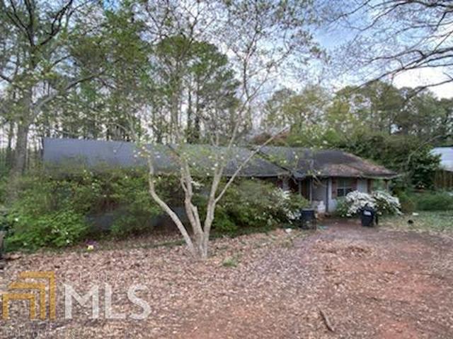 Awesome Investment Opportunity in Conyers 3 bedroom 2 bath home on great lot, perfect fixer upper with great bones. No disclosure, SOLD AS IS. Cash only!