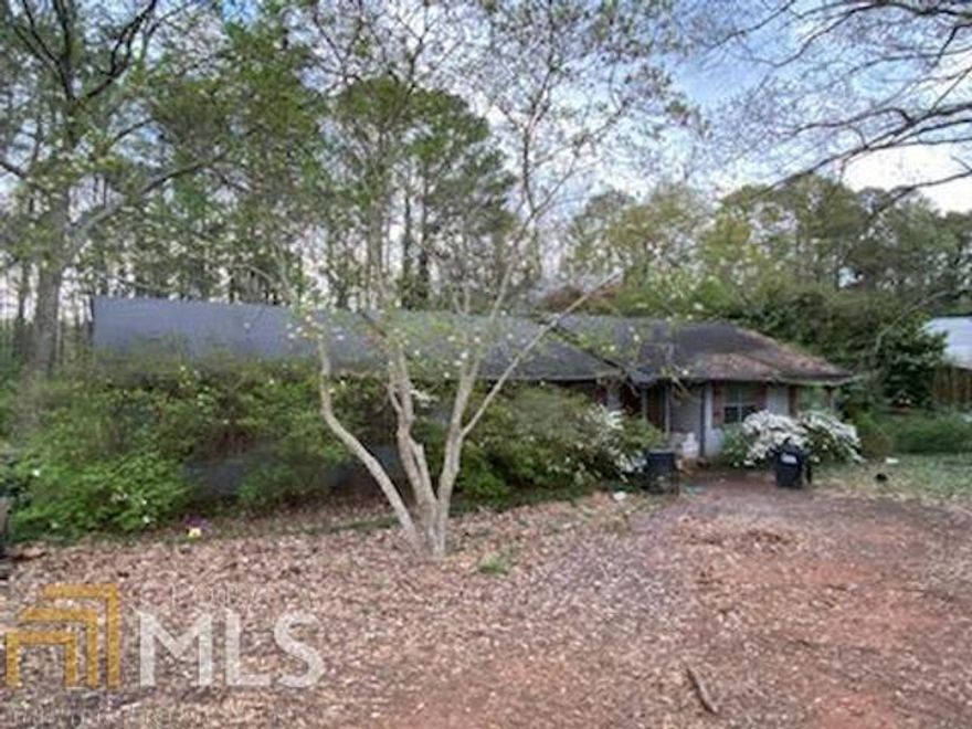 Awesome Investment Opportunity in Conyers 3 bedroom 2 bath home on great lot, perfect fixer upper with great bones. No disclosure, SOLD AS IS. Cash only!