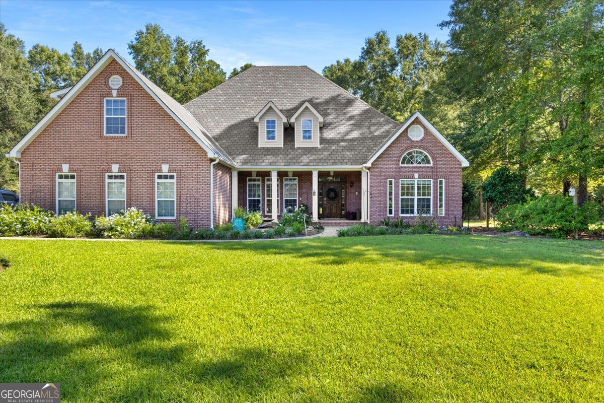 Welcome to your dream home in theheart of Perry! Tucked away in a quietcul-de-sac in the desirable Yorktown subdivision, this 5-bed, 3-bath beauty offers both peace and convenience. Just minutes from Perry Parkway-where new shops, restaurants, and entertainment are popping up everyday-you'll be right where everyone wants to be. Step inside and be impressed by the thoughtful layout: three bedrooms on the main level (including aHUGE master suite with two walk-inclosets) and two additional bedrooms upstairs for plenty of space to spread out. A formal dining room and a private office give you options for hosting, working, or relaxing. The kitchen is the heart of the home with loads of cabinet space, a generous layout, and brand-new appliances that stay. The master bath feels like your own spa retreat, with room to truly unwind. Outside, the curb appeal speaks for itself-manicured landscaping and even specialty shingles that add the perfect finishing touch to this already stunning home.