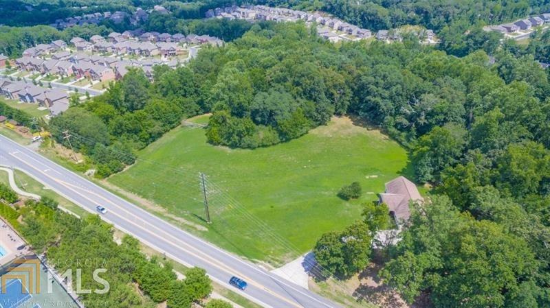 Undeveloped, open and wooded land in highly desirable Forsyth County. Appealing 4.73 acres, gently sloping to rolling, homogeneous shaped lot with good residential and re-development potential. Property bounded by high end residential properties with access to public utilities (water, sewer, electric, gas). Excellent location. Close to great schools, shopping, parks, entertainment, recreation, Lake Lanier and N GA mts with access to metro Atlanta, Alpharetta and Roswell via I-85 and GA 400.
