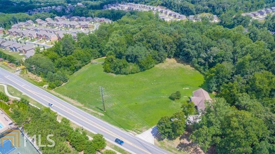 Undeveloped, open and wooded land in highly desirable Forsyth County. Appealing 4.73 acres, gently sloping to rolling, homogeneous shaped lot with good residential and re-development potential.  Property bounded by high end residential properties with access to public utilities (water, sewer, electric, gas). Excellent location. Close to great schools, shopping, parks, entertainment, recreation, Lake Lanier and N GA mts with access to metro Atlanta, Alpharetta and Roswell via I-85 and GA 400.