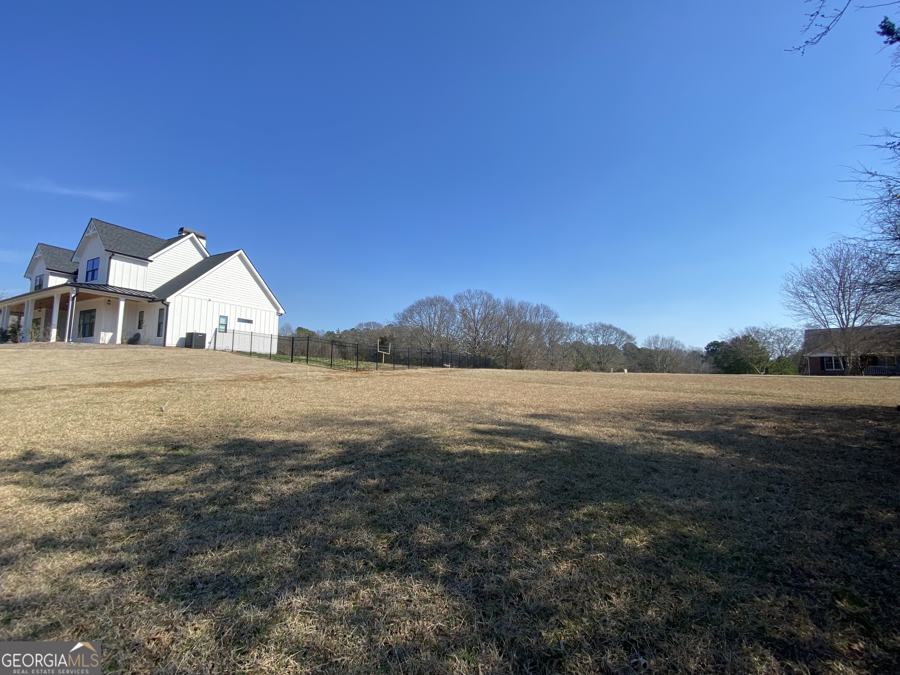 Majestic Shores is an upscale subdivision of newer homes in the sought-after Carter's Ferry area of the lake. You will have easy access to shopping and restaurants in the town of Hartwell. Lakefront and interior lots are available. The lakefront lots have private docks in place and each interior lot includes a private covered slip in the community dock. All of the lots have easy build sites and some are already cleared. The developer is also offering lot/build packages. Lot 9 is .56 acres in size.