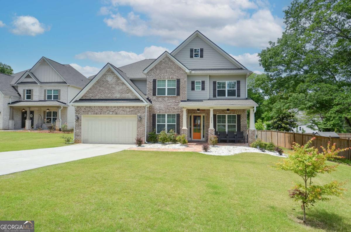 BUYER INCENTIVE! SELLER WILL PROVIDE BUYER WITH A $5,000 ALLOWANCE FOR CLOSING COSTS OR INTEREST RATE BUY-DOWN with an acceptable offer. Stunning Nearly New Construction in the Heart of Marietta. Welcome to this immaculate 5-bedroom, 4-bath home situated on a spacious half-acre lot, blending modern design with timeless comfort. Step inside to a semi-open floor plan featuring soaring 10' ceilings and sleek LVP flooring throughout the main level. The elegant dining room boasts coffered ceilings and easily seats tenCoperfect for entertaining. The chefCOs kitchen is a dream with quartz countertops, stylish gray cabinetry, stainless steel appliances, a farm sink, large center island, and a walk-in pantry. The adjoining family room is warm and inviting with a cozy gas fireplace and an abundance of natural light. A spacious guest bedroom and full bath on the main level provide comfort and convenience. Upstairs, retreat to the oversized master suite featuring trey ceilings, a separate sitting area, and dual walk-in closets. The spa-like master bath includes a double vanity, quartz countertops, large tiled walk-in shower with frameless glass door, and a separate soaking tub. Three additional upstairs bedrooms offer vaulted ceilings, ample space, a Jack-and-Jill bath, and a private ensuite. A wide hallway, full laundry room with storage, and high ceilings complete the upper level. Enjoy outdoor living with custom stamped concrete patios in the front and back. The backyard features two covered patio areas, perfect for relaxing or entertaining. A long driveway provides ample parking. Located close to top-rated schools, parks, restaurants, shopping, and easy access to the interstate. DonCOt miss the opportunity to show your buyers this fabulous homeCoschedule a tour today before it's gone!